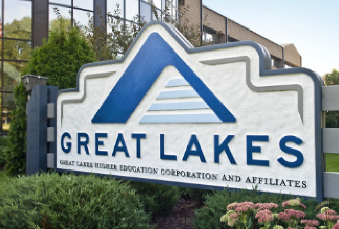Sign in front of building that reads Great Lakes