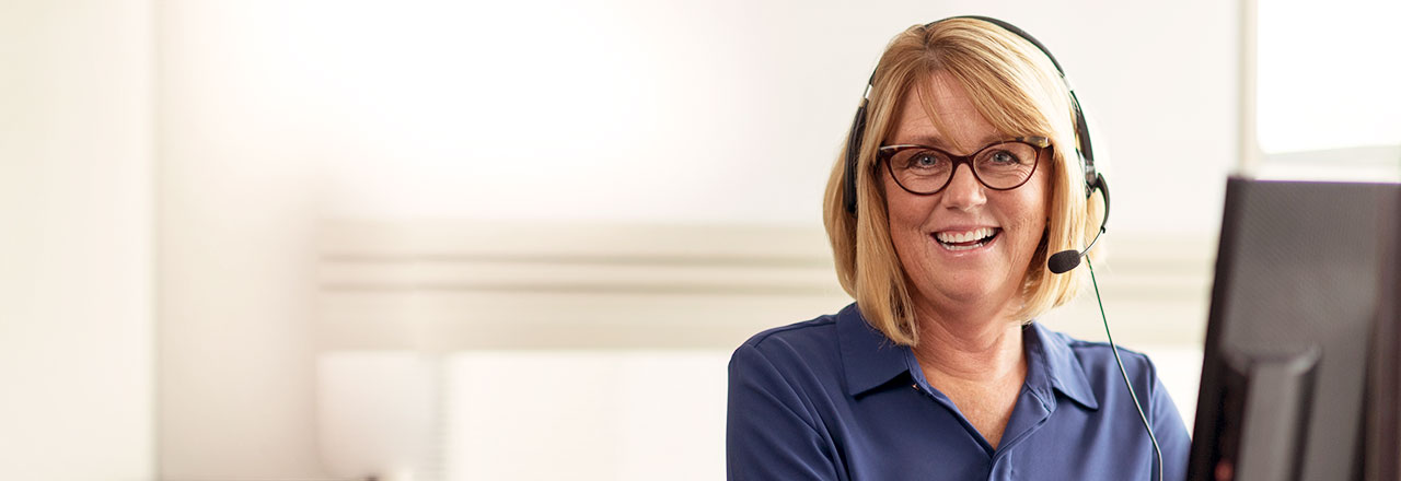 Woman with headset providing support