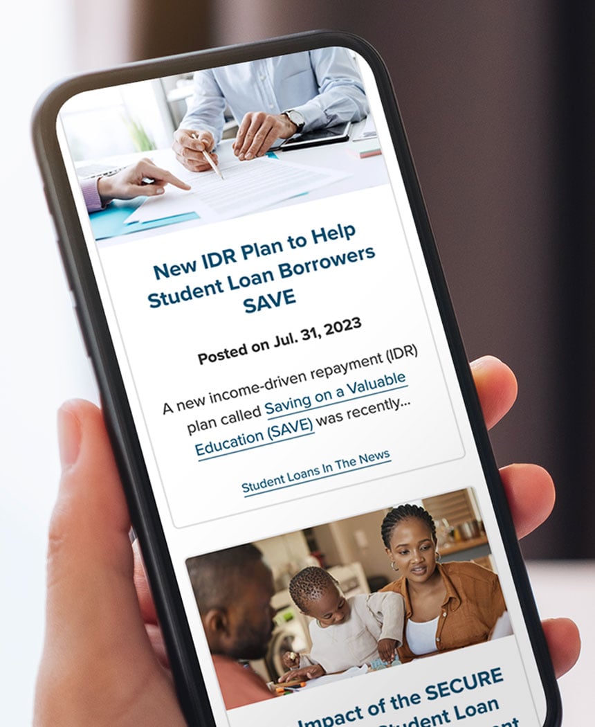 person holding a phone with the news and insights page showing.
