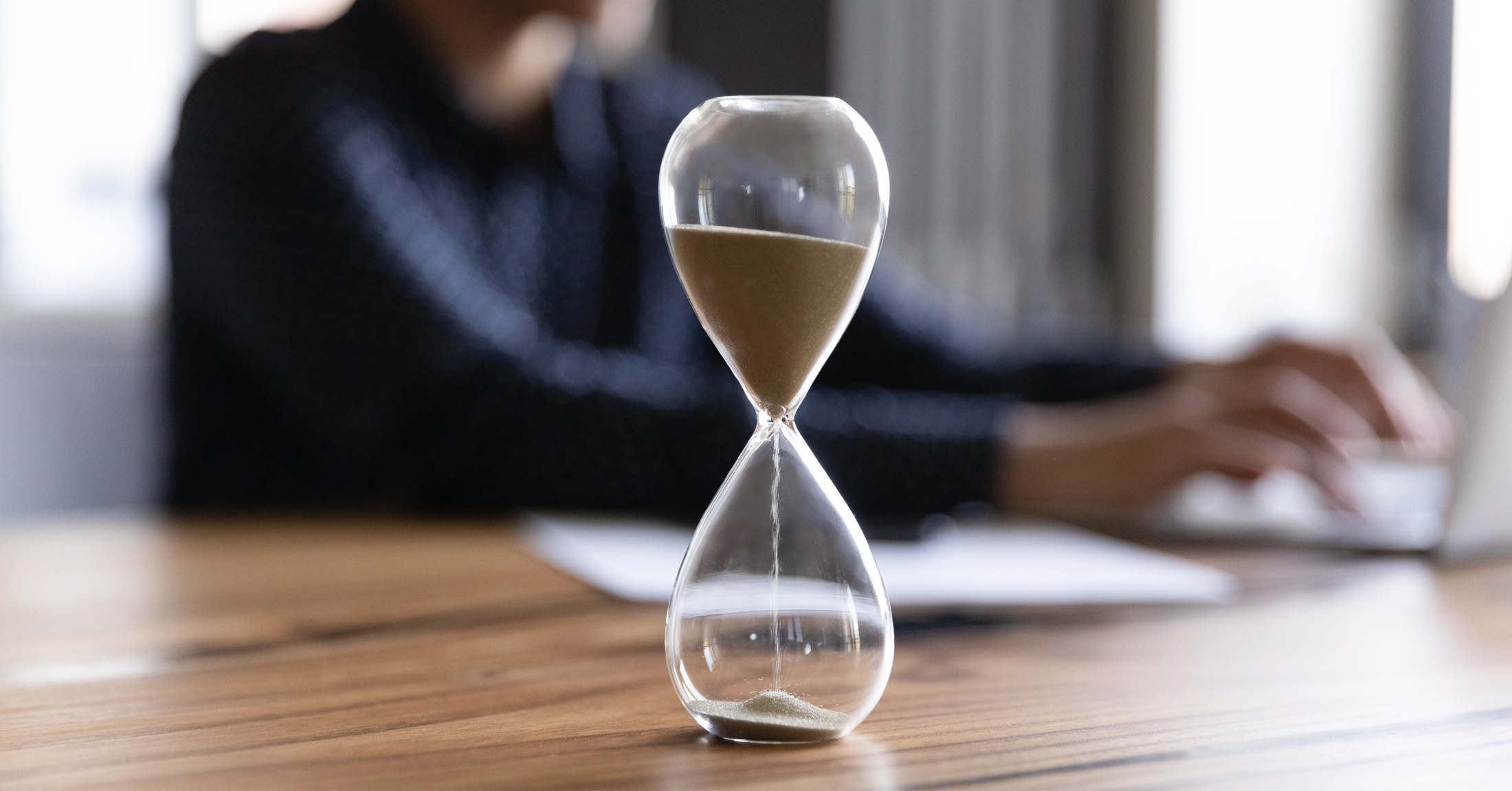 hourglass sitting on table